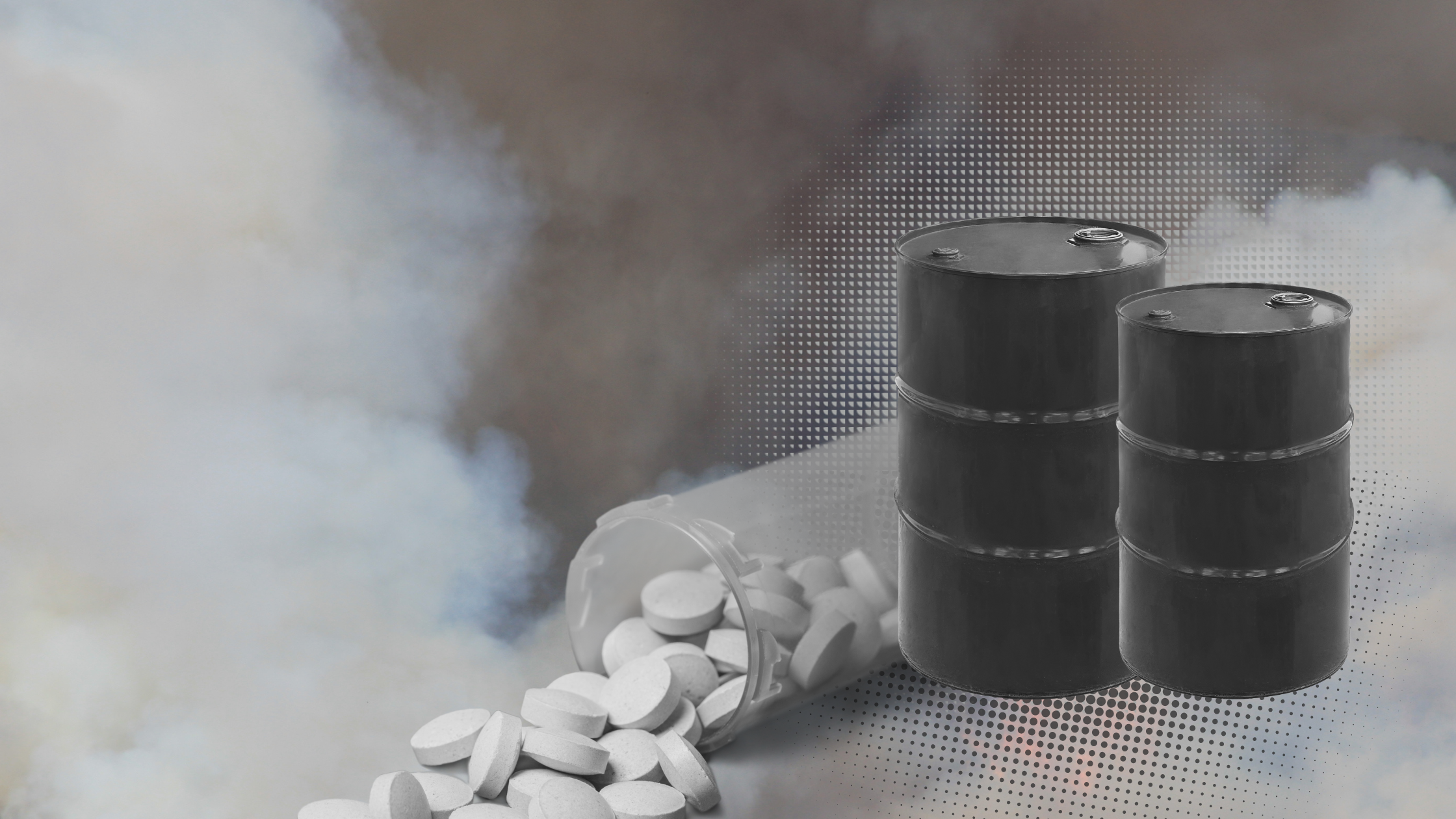 Black & white image of overturned pill bottle with pills spilling out, next to oil barrels with smoke in the background